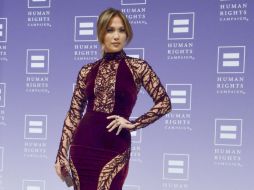 Jennifer López recibió el galardón ''Ally for Equality 2013'' el sábado en Washington. AFP /
