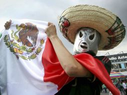 Éstas y otras expresiones se podían ver entre los seguidores del Tri. NTX /