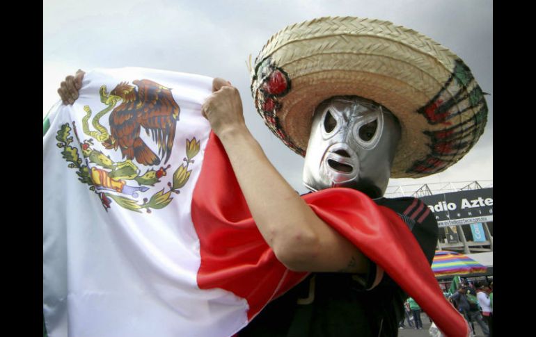 Éstas y otras expresiones se podían ver entre los seguidores del Tri. NTX /