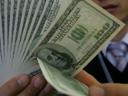 La divisa estadounidense ganó terreno frente al peso el día de hoy. ARCHIVO /