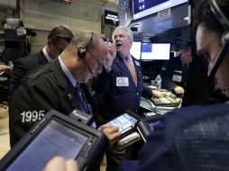 Tras subir varios días en sus indicadores, Wall Street tuvo jornada negativa este miércoles. ARCHIVO /