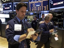 El anuncido de la Reserva Federal de mantener sus estímulos generó inquietudes entre los inversores. AP /