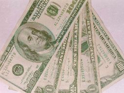 El peso seguirá volátil respecto a los indicadores de la bolsa en Estados Unidos. ARCHIVO /