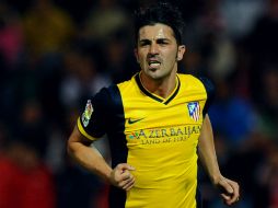 Aquí, Villa festejando su anotación al minuto 78. AFP /