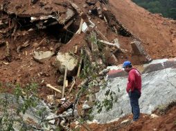 Los policías cayeron mientras realizaban labores de rescate en La Pintada. ARCHIVO /