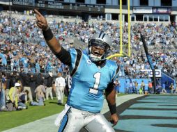Cam Newton tuvo otro buen día a la ofensiva, consiguiendo la cuarta victoria consecutiva para su equipo. AP /