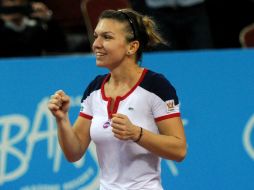 Simona Halep tiene el mejor año de su carrera, con seis títulos ganados. AFP /