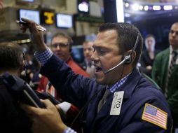 El NYSE Composite y el Nasdaq Composite siguen la tendencia a la baja en la Bolsa de NY. ARCHIVO /