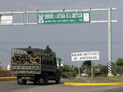 La autodefensa se dice confiada en que con la entrada del Ejército en la entidad se tome el control de la región. AP /