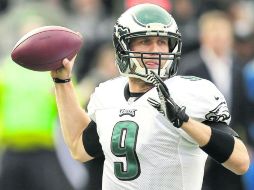 Nick Foles concluyó el duelo del domingo con 406 yardas. AP /