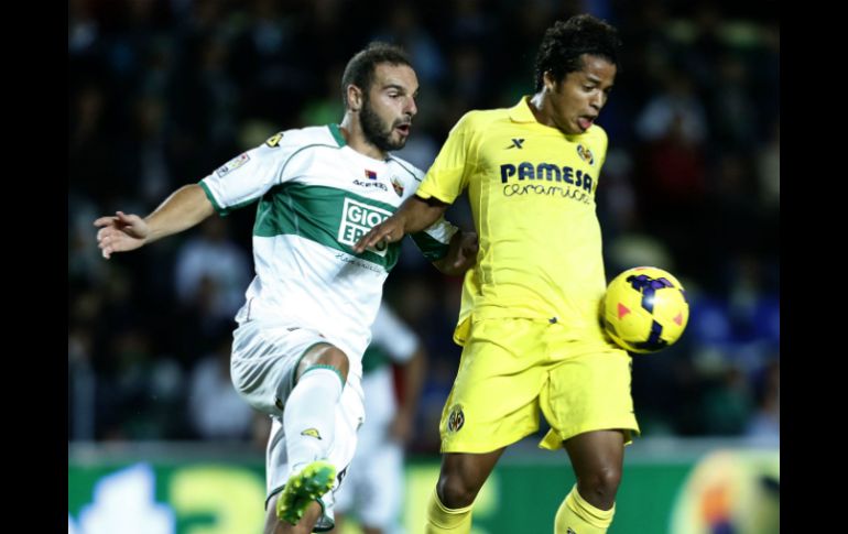 Dos Santos se perderá el duelo ante los Colchoneros. AFP /