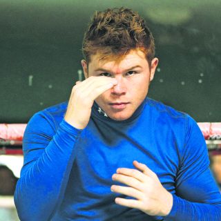 Tientan a Cotto a billetazos