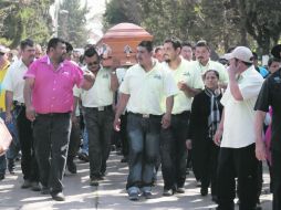 Familiares, políticos y ciudadanos despidieron al alcalde de Santa Ana Maya, Ygnacio López Mendoza, asesinado el jueves pasado. NTX /