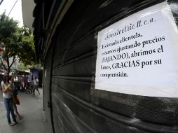 El aumento de precios de forma ilegal ha afectado la economía de los venezolanos. AFP /