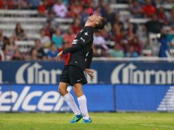 Flavio Santos -en la foto- y Matías Vuoso quedan sancionados con un partido de castigo a pagar en el Torneo Clausura 2014. ARCHIVO /