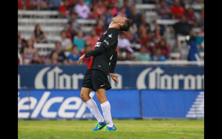 Flavio Santos -en la foto- y Matías Vuoso quedan sancionados con un partido de castigo a pagar en el Torneo Clausura 2014. ARCHIVO /