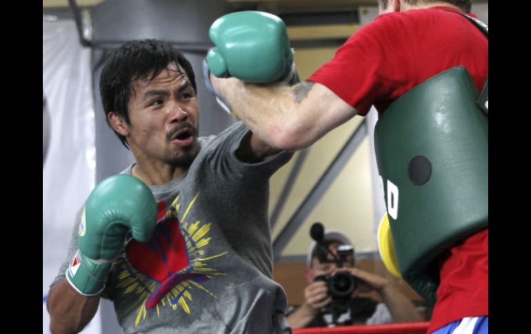 Manny se preocupa por sus 'paisanos' y exhorta a todos a orar por las víctimas. AP /