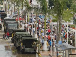 Elementos del Ejército Mexicano apoyan a los damnificads en Minatitlán, Veracruz. SUN /