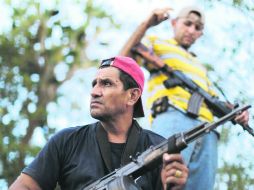 Foto de pobladores de Buenavista Tomatlán, Tepalcatepec y Coalcomán que ingresaron a la zona boscosa de El Pareo. AP /