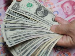 La compra de bonos por parte del banco central tiene la intención de mantener bajas las tasas de interés a largo plazo. ARCHIVO /