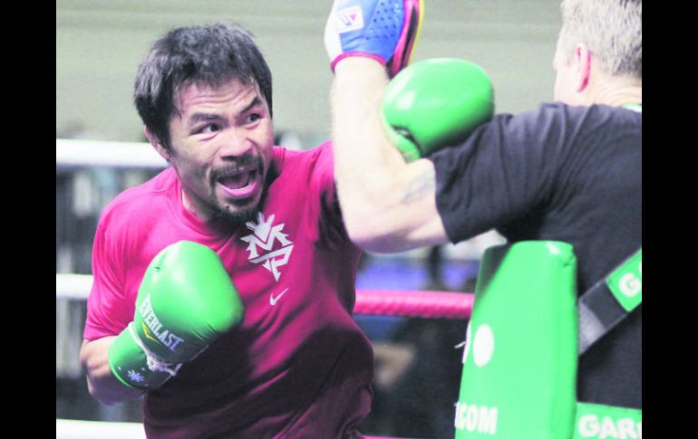 Manny Pacquiao realiza una sesión de entrenamiento con Freddie Roach, previo al combate contra Brandon Ríos. EL INFORMADOR /