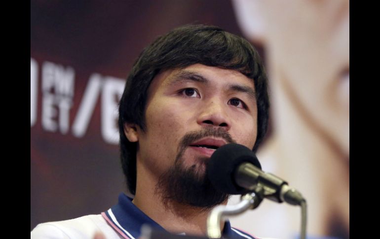 Manny tiene la confianza de su entrenador, que se ha visto envuelto en un escándalo. AP /