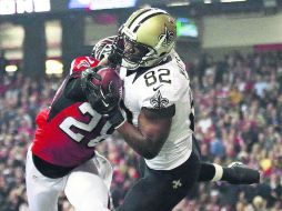 Adentro. Benjamin Watson recibe un pase de anotación. AP /