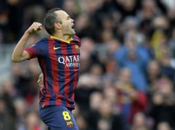 Andrés Iniesta (foto) y Cesc Fábregas cobraron un penal cada uno. El partido terminó 4-0 a favor del cuadro azulgrana. AFP /