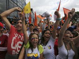 Seguidores del líder opositor Henrique Capriles durante las manifestas de ayer, en Caracas. AP /