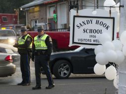 El fiscal encargado del caso presenta un informe a casi un año de que ocurriera la matanza de 20 niños y seis mujeres. ARCHIVO /