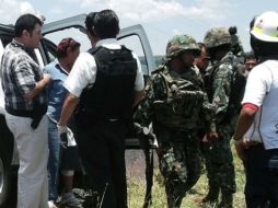 Las autoridades reportaron haber encontrado tres cuerpos en una predio conocido como Barranca de Chila. ARCHIVO /