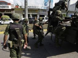 La situación en Tancítaro se ha mantenido en calma durante los últimos días, el Ejército y la Policía Federal vigilan la zona. ARCHIVO /
