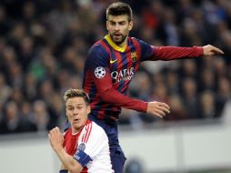 El central Gerard Piqué, reconoce que brindaron una 'horrible' imagen en la Amsterdam Arena. AFP /
