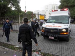 Policías resguardaban el lugar tras la balacera. ARCHIVO /