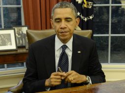 Barack Obama se encuentra por debajo en aprobación de presidentes como Ronald Reagan y Bill Clinton. ARCHIVO /