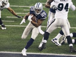DeMarco Murray fue el pistón de la ofensiva de Dallas con tres anotaciones. AP /