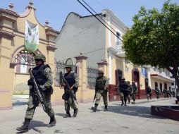 El  arribo de más fuerzas federales a Michoacán busca evitar que continúe el avance de los grupos de autodefensa en el estado. ARCHIVO /