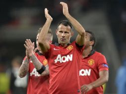 Ryan Giggs sigue siendo un hombre impotarte con lso Red Devils a los 40 años. AP /
