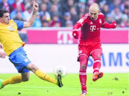 Después de establecer el récord de 10 victorias consecutivas en Champions, los bávaros se encaminan invictos al título germano. AFP /