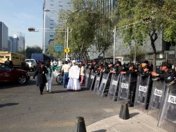 Elementos de la SSPDF resguardan las inmediaciones del Senado durante el cerco. SUN /