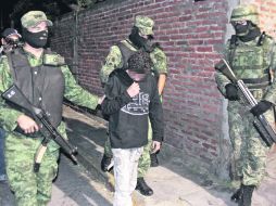 Edgar Jiménez Lugo, alias el “Ponchis”, es una muestra del poder que ejerce el narco sobre los menores de edad en el país. AP /