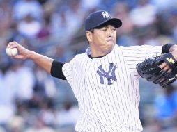 Kuroda llegó con los Yanquis en 2012 y ahora firmó un contrato por 16 millones de dólares que lo mantendrá un año más en Nueva York. AP /