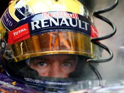 Vettel fue campeón cuando aún faltaban tres carreras para finalizar el campeonato. AFP /