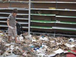 Las revueltas policiales por demandas salariales y los saqueos comenzaron  la semana pasada en numerosas provincias. AP /