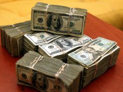 El tipo de cambio para solventar obligaciones en moneda extranjera pagaderas en la República Mexicana es de $12.8574 pesos. ARCHIVO /