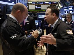 Los inversores se han mantenido a las expectativas de lo que haga la Reserva Federal en torno a sus estímulos. ARCHIVO /