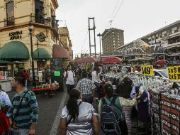 El 5 de diciembre pasado el presidente municipal se comprometió con los comerciantes establecidos a retirar el ambulantaje. ARCHIVO /