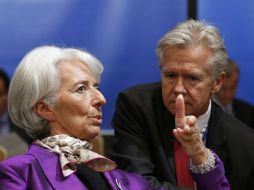 Christine Lagarde, Directora del FMI (I) habla con el director del Departamento de Relaciones Externas, Gerry Rice. ARCHIVO /