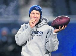 Antonio Ramiro Romo, mariscal de campo de Dallas, tiene marca perdedora jugando en diciembre. AP /