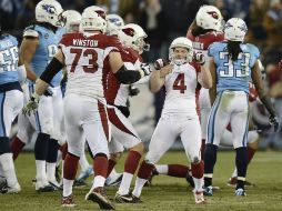 Jay Feely (4) celebra la anotación del gol de campo con el que los Cardenales se llevaron el triunfo. AP /